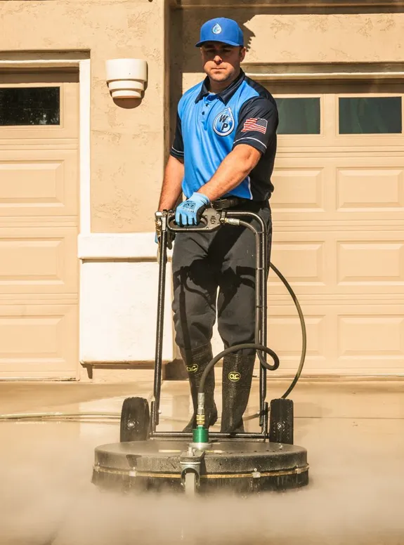 Wash Patrolman Steam Cleaning Concrete Driveway in Tucson